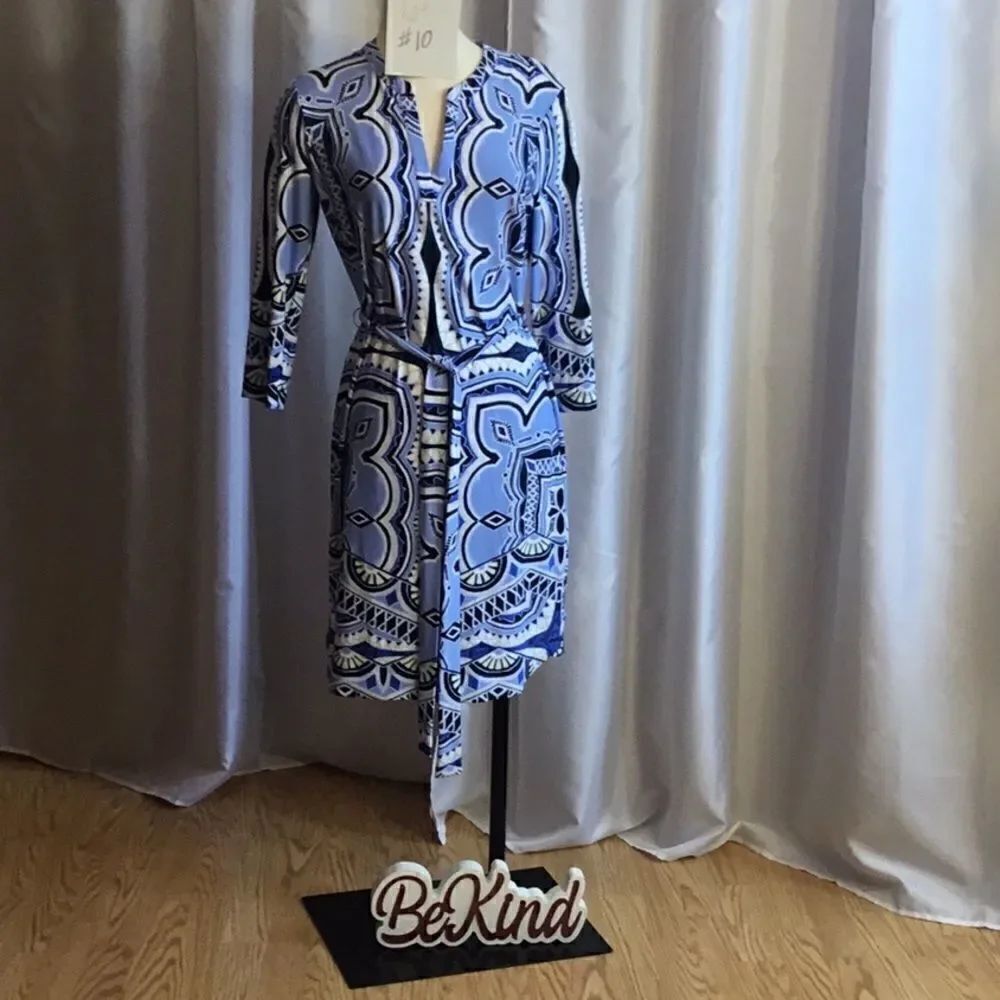 Pull on style dress with 3/4 sleeve matching belt